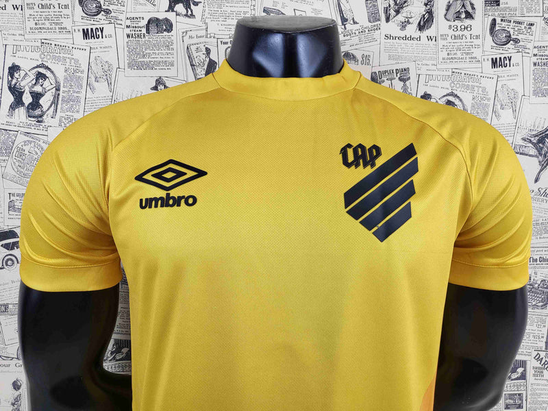 camisa-athletico paranaense-goleiro-amarela-umbro-23-24-neymar-messi-cr7-futebol