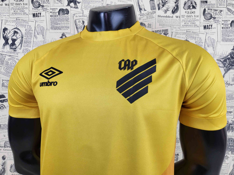 camisa-athletico paranaense-goleiro-amarela-umbro-23-24-neymar-messi-cr7-futebol