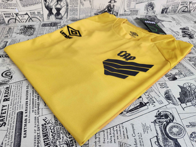 camisa-athletico paranaense-goleiro-amarela-umbro-23-24-neymar-messi-cr7-futebol