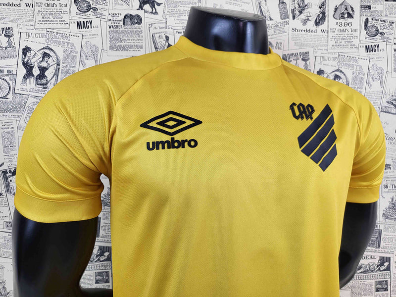 camisa-athletico paranaense-goleiro-amarela-umbro-23-24-neymar-messi-cr7-futebol