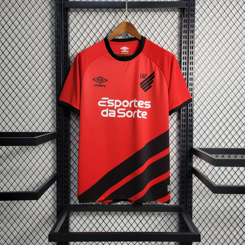 camisa-athletico paranaense-home-i-1-vermelha-esportes da sorte-umbro-23-24-neymar-messi-cr7-futebol 