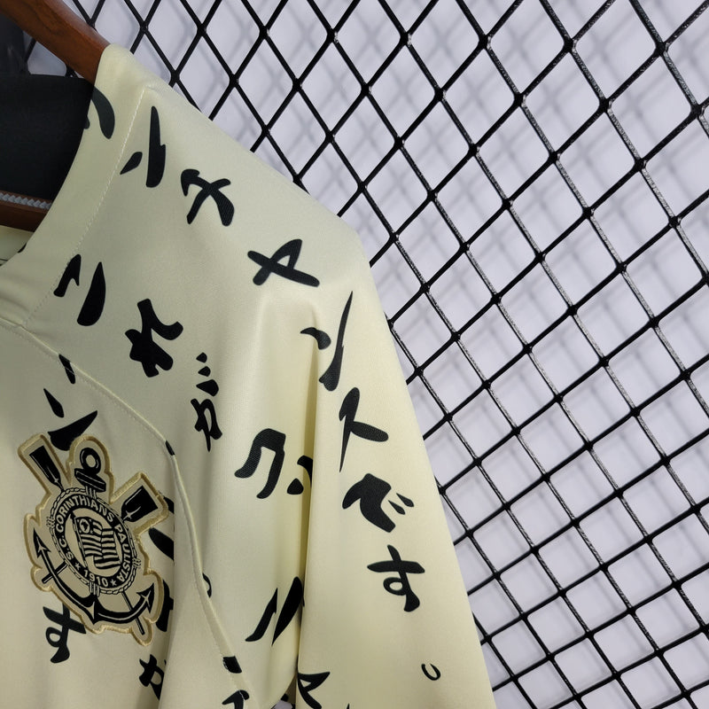 camisa-corinthians-japão-iii-3-creme-nike-22-23-neymar-messi-cr7-futebol 